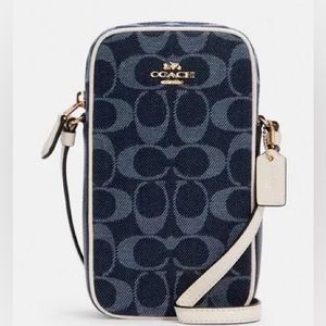 North/ South cross body in signature Jacquard coach bag in blue